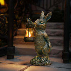 Zuzuzen bunny statue with solar lantern adds welcoming glow to patios.