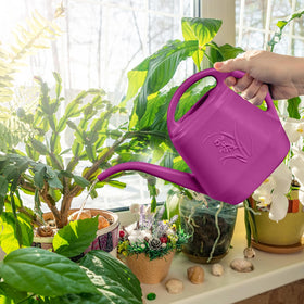 ZXJ long-spout design minimizes spills when reaching tight spots.