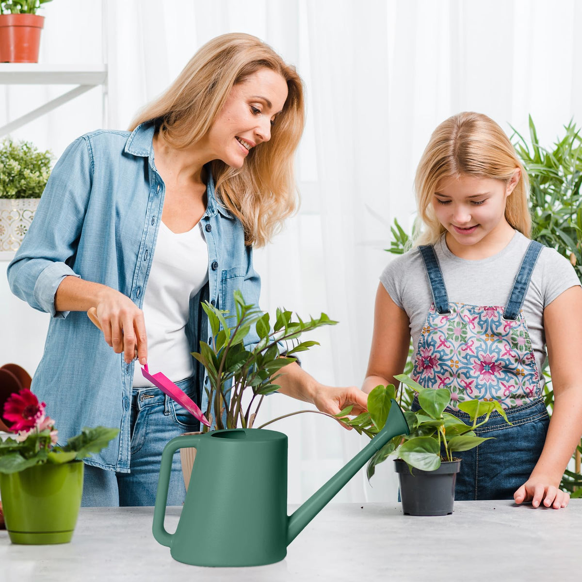 ZXJ watering can used outdoors in garden setting